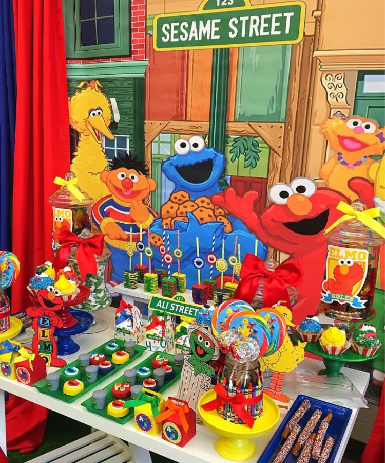 Sesame Street first birthday dessert table