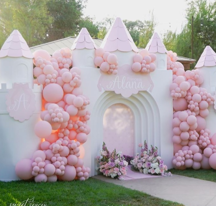 pink princess castle and balloons