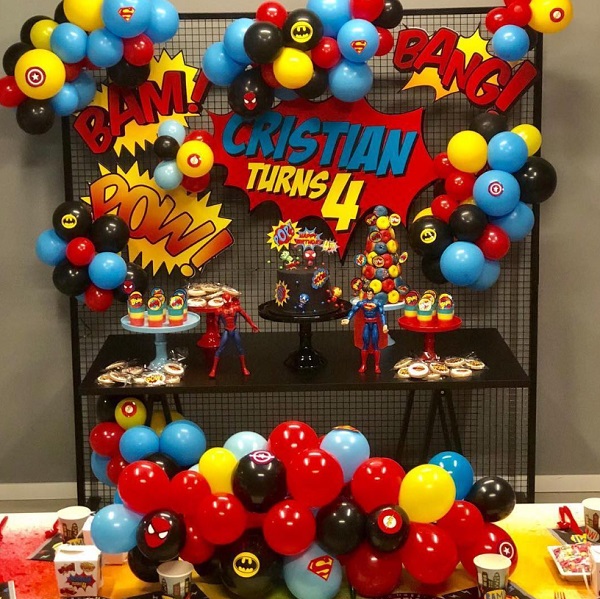 superhero themed birthday dessert table