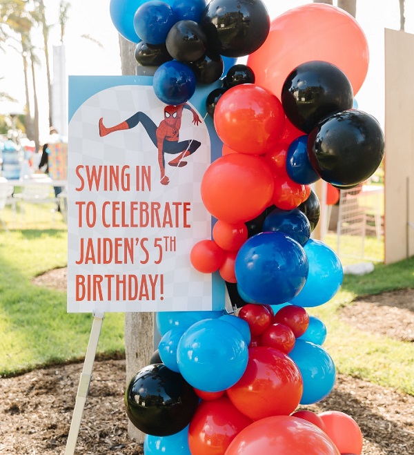 swing in to celebrate welcome sign