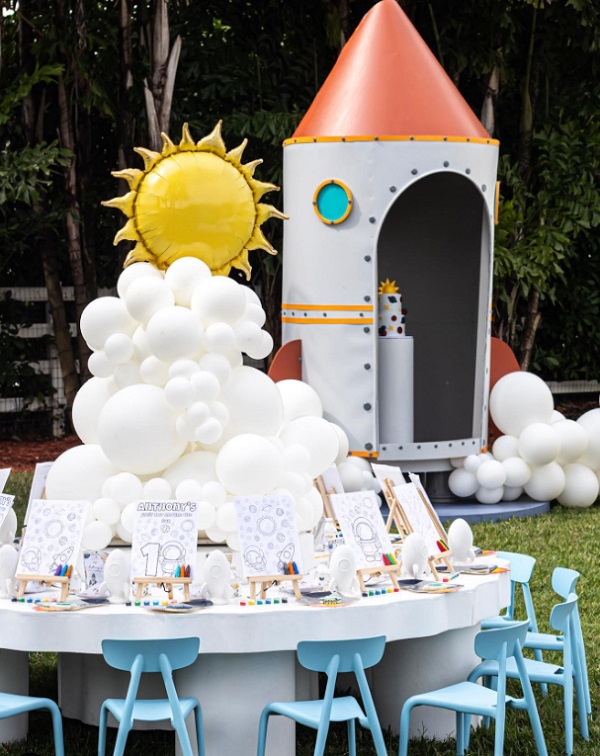 out of this world cake setup inside huge rocket