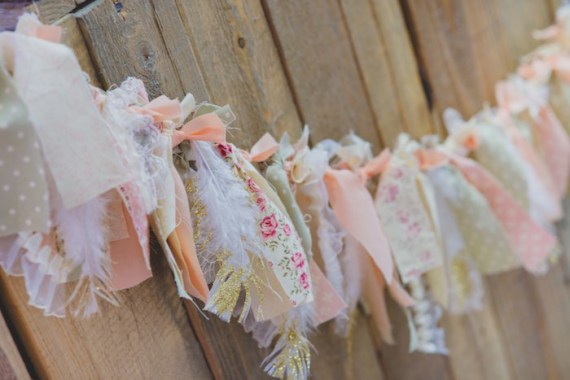 Little Bird Party ideas tassels with feathers in gold glitter tips