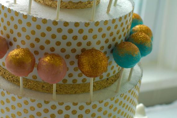 jack-and-jill-inspired-birthday-party-treats-cake-pops-on-cake
