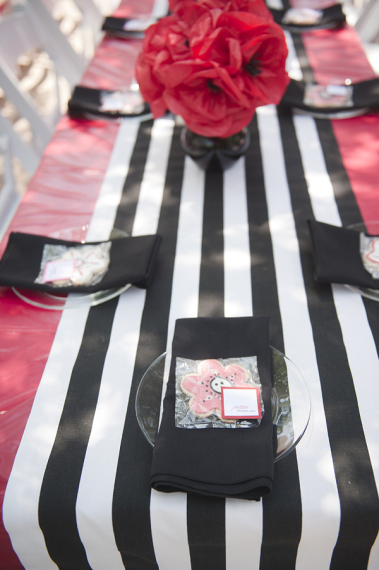 poppy-party-with-black-white-stripes-sitting-area-clear -chairs