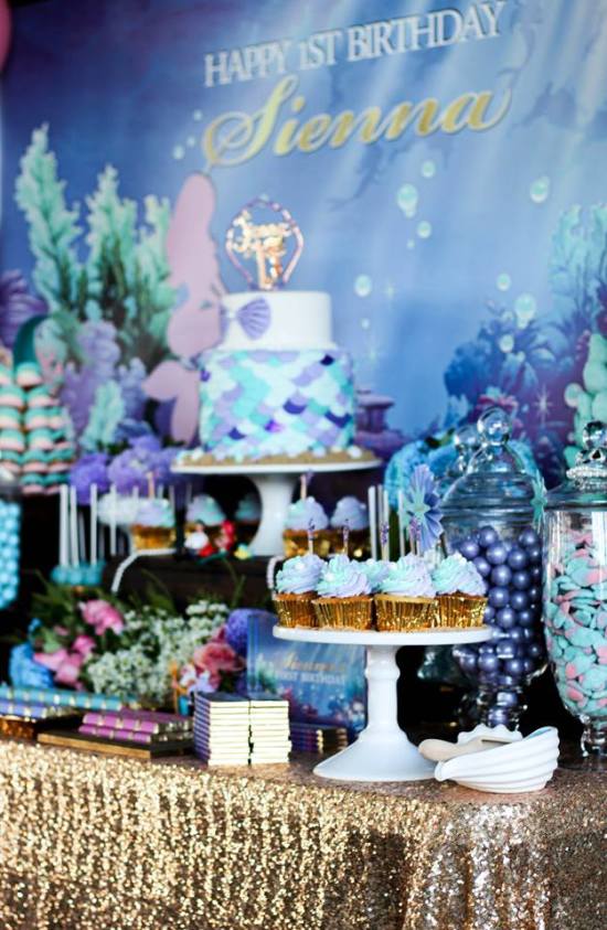 Under the Sea First Birthday Party backdrop and dessert table