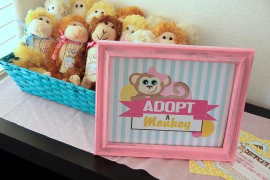 curious george inspired monkey party, adopt a monkey station