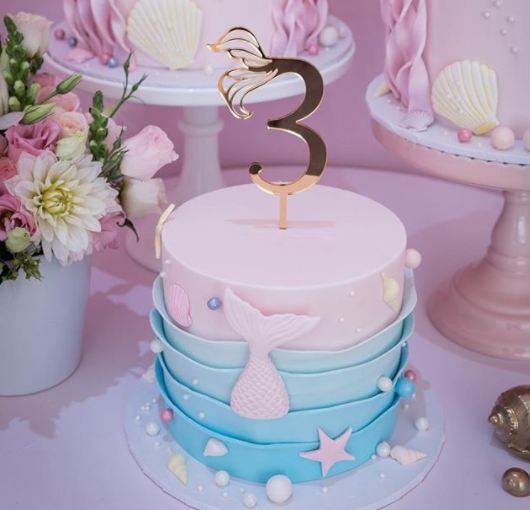 mermaid cake with mermaid tail gold topper