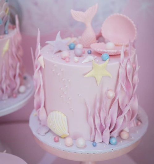 pink mermaid cake with stunning toppers