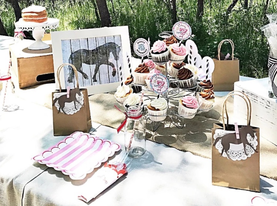 pink and brown horse party table setting