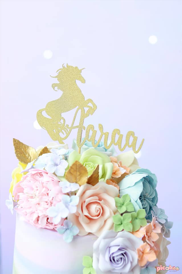 magical unicorns party cake with florals