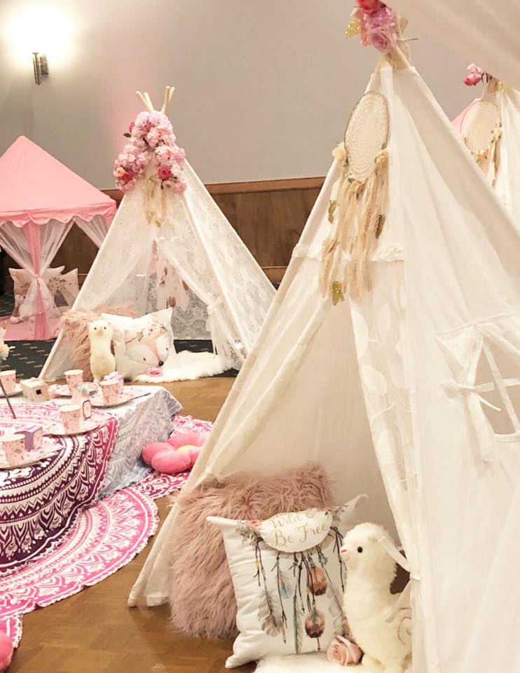 bohemian feathers and arrows party tent