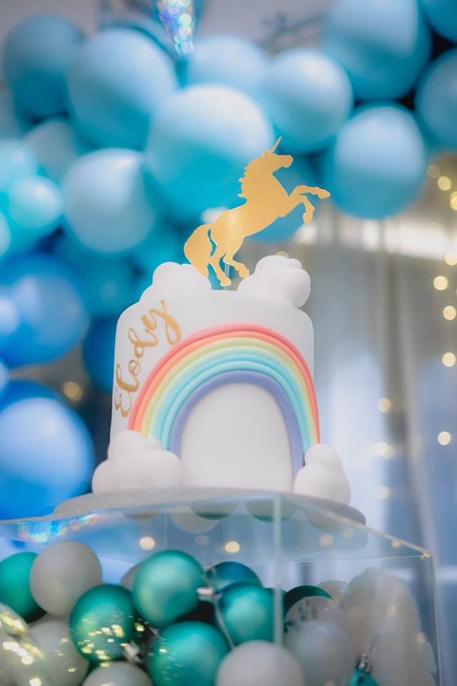 unicorn cake with gold topper