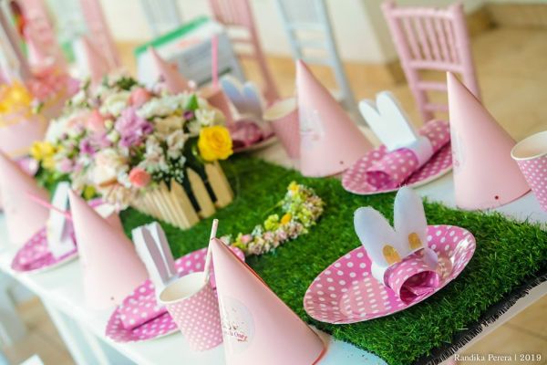 flower garden pink bunny first birthday table setup