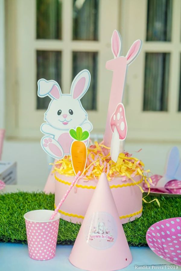 pink bunny cutout table centerpieces on grass