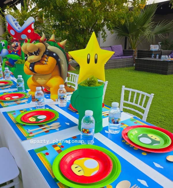 mario game characters party with green pipe table centerpiece