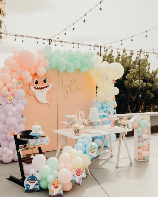 sweet baby shark first birthday party setup