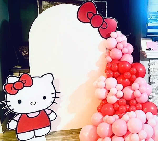 pink and red hello kitty themed birthday backdrop