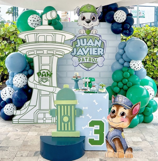 blue and green paw patrol dessert table