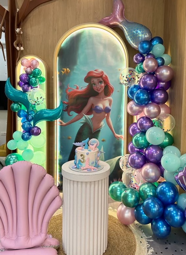 beautiful little mermaid in mirror backdrop