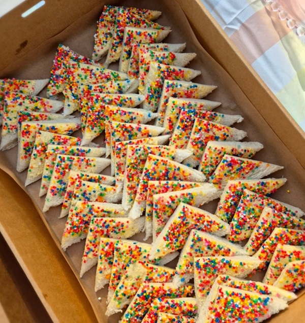 fairy bread white fluffy bread smothered with butter and covered in sprinkles