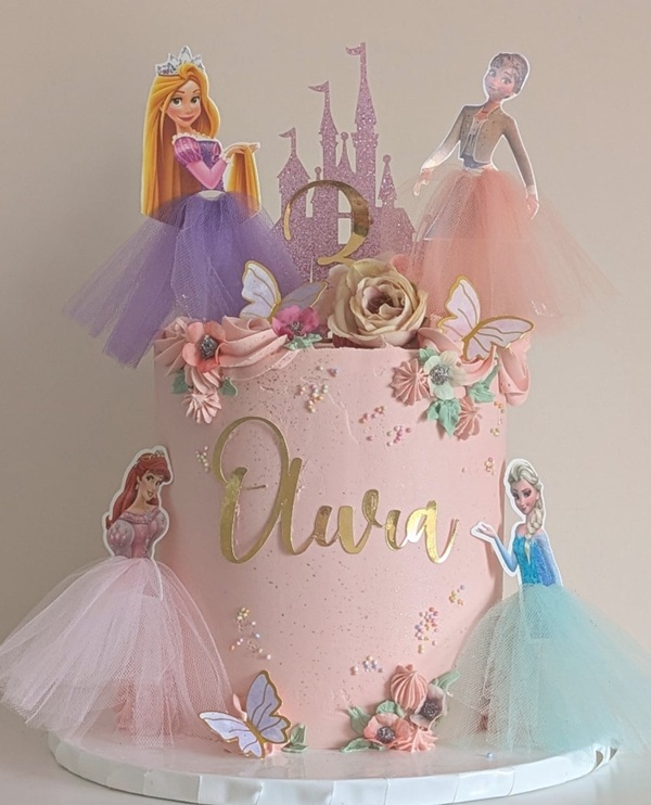princess birthday cake with disney princess toppers