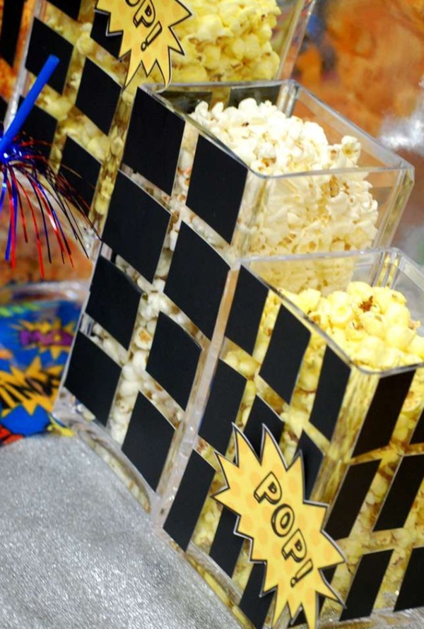 popcorn in superhero building containers